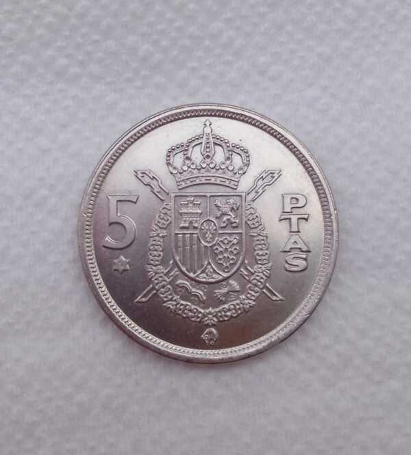 Monedas antiguas de 5 pesetas de 1975