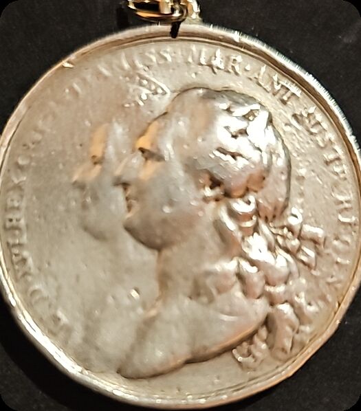 Medallón de plata
