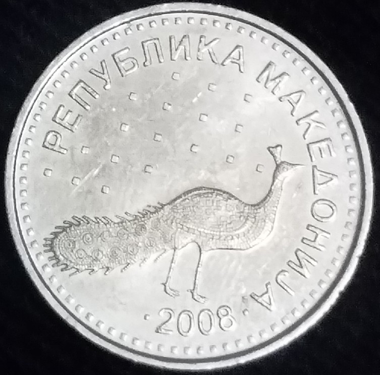 Photo 1 Pièce de monnaie non identifiée: ¿Ayuda para identificar esta pieza?