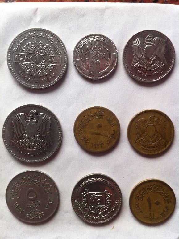 Photo 1 Pièce de monnaie non identifiée: Alguien puede decirme a que pais pertenecen estas monedas?