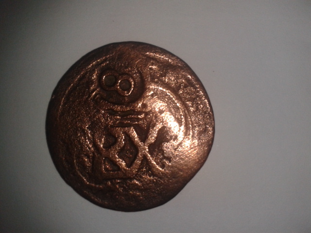 Photo 2 Pièce de monnaie non identifiée: moneda de cobre inscripcion: RX 
