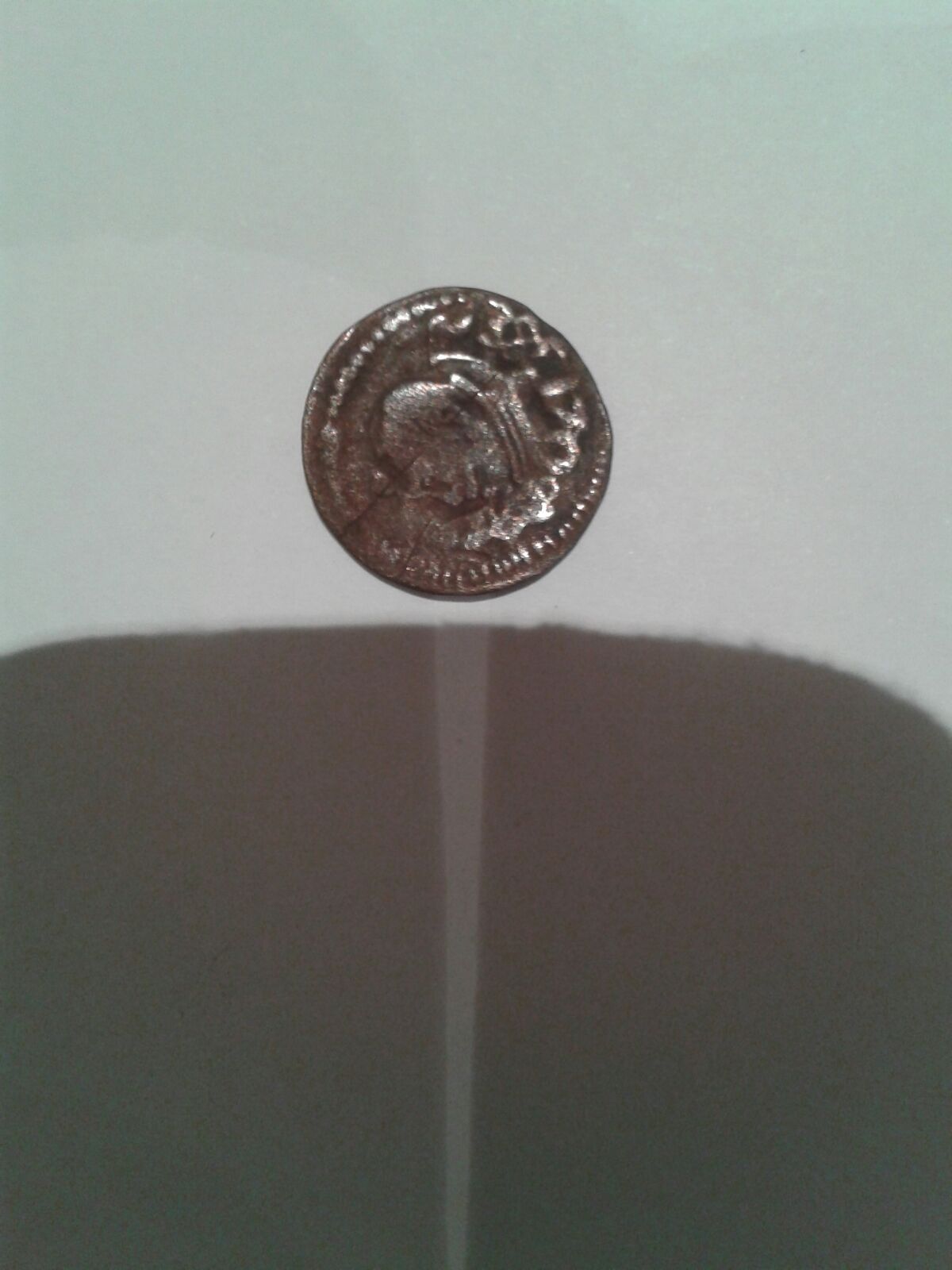 Photo 2 Pièce de monnaie non identifiée: moneda sin identificar