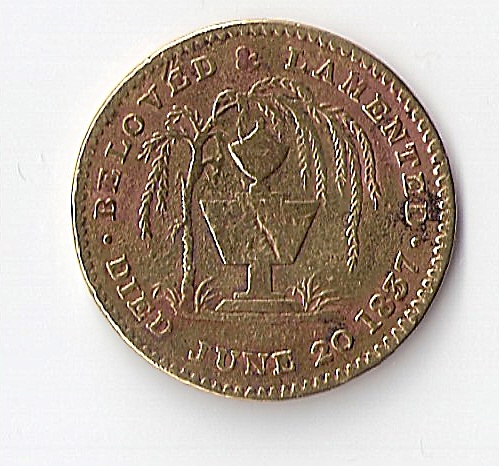 Photo 2 Pièce de monnaie non identifiée: es moneda?