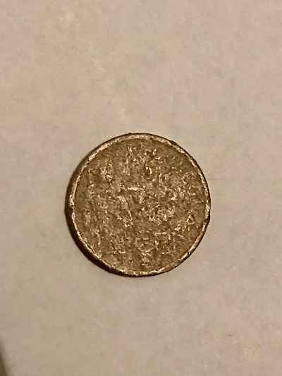 Photo 1 Pièce de monnaie non identifiée: Moneda gastada