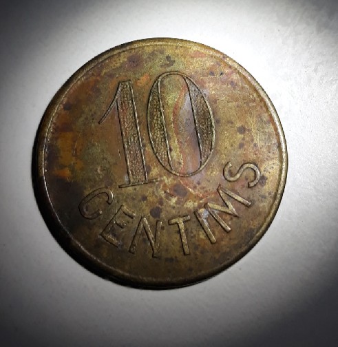 Photo 2 Pièce de monnaie non identifiée: El valor?