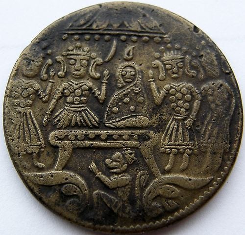 Photo 2 Pièce de monnaie non identifiée: la pieza es asiatica pero no se el pais, si es moneda o no.año¿? 