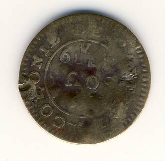 Photo 2 Pièce de monnaie non identifiée: Moneda desgastada