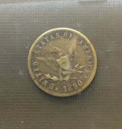 Photo 2 Pièce de monnaie non identifiée: Moneda de EEUU 1890