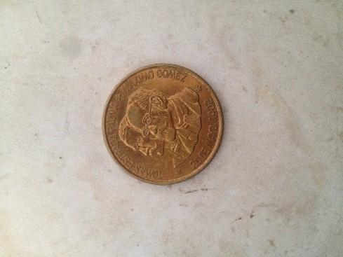 Photo 2 Pièce de monnaie non identifiée: Que moneda es y cual es su valor?