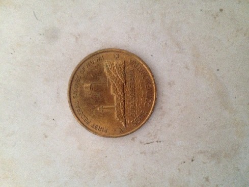 Photo 1 Pièce de monnaie non identifiée: Que moneda es y cual es su valor?