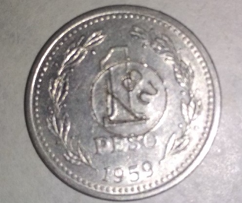 Photo 1 Pièce de monnaie non identifiée: Sello raro moneda Argentina