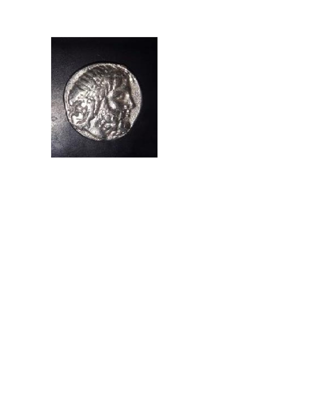 Photo 2 Pièce de monnaie non identifiée: moneda o adorno