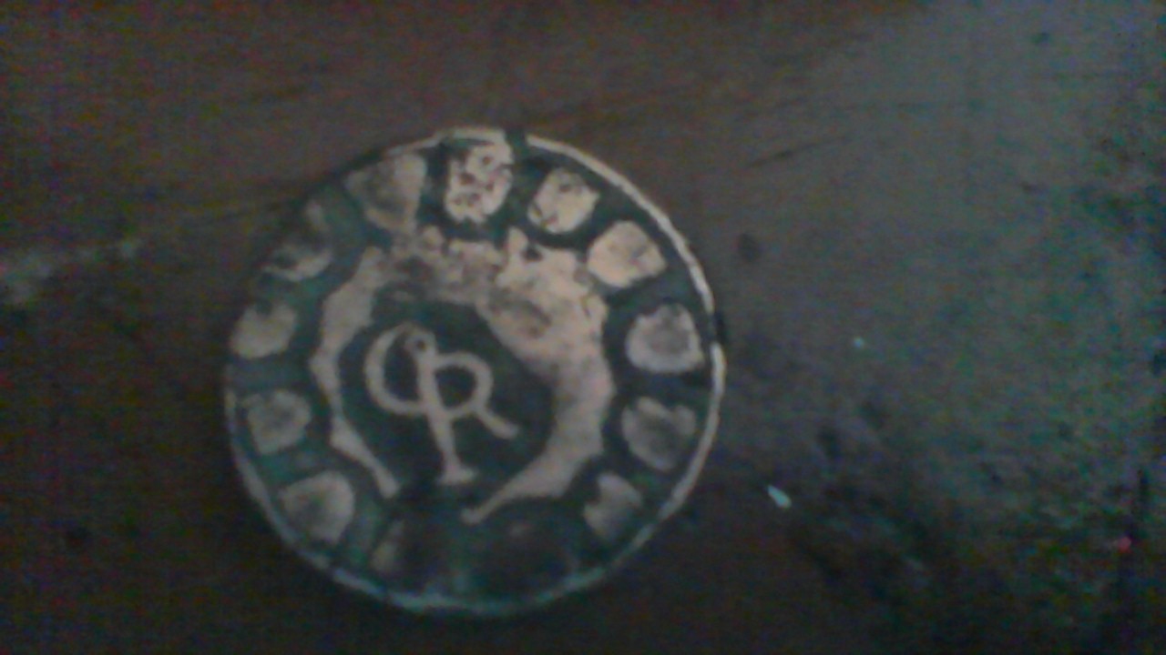 Photo 1 Pièce de monnaie non identifiée: moneda (25/07/2015