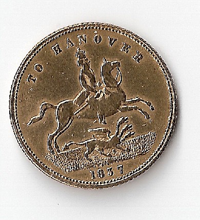 Photo 2 Pièce de monnaie non identifiée: es moneda?