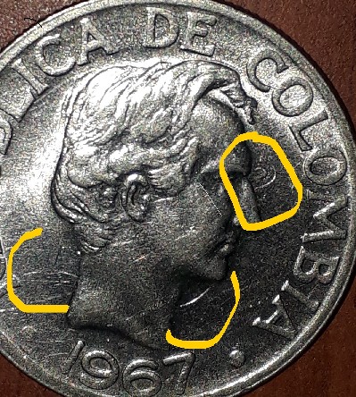 Photo 1 Pièce de monnaie non identifiée: moneda de 59 centavos de 1967 de colombia con error