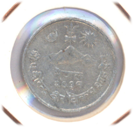 Photo 2 Pièce de monnaie non identifiée: Etre dos paises