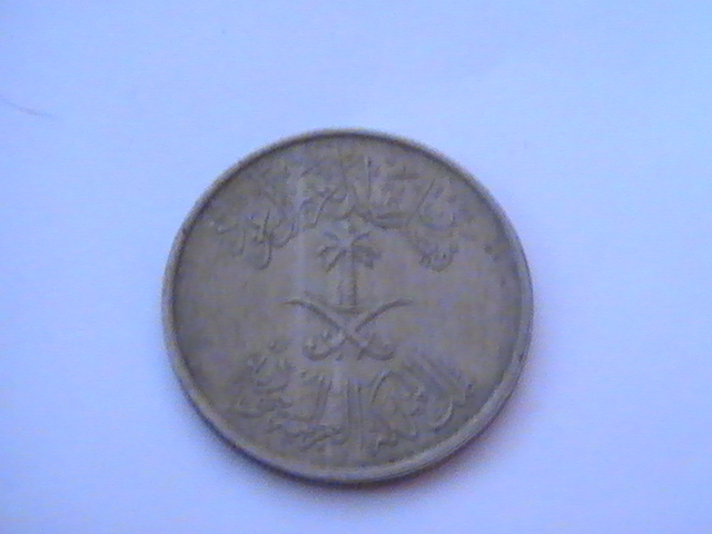 Photo 1 Pièce de monnaie non identifiée: ni idea