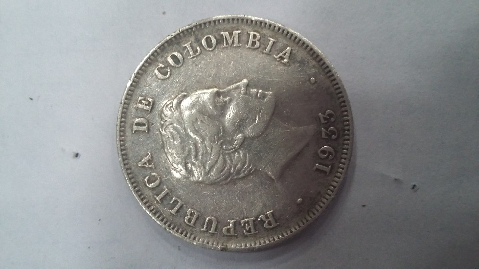 Photo 2 Pièce de monnaie non identifiée: moneda Hotel sabaneta