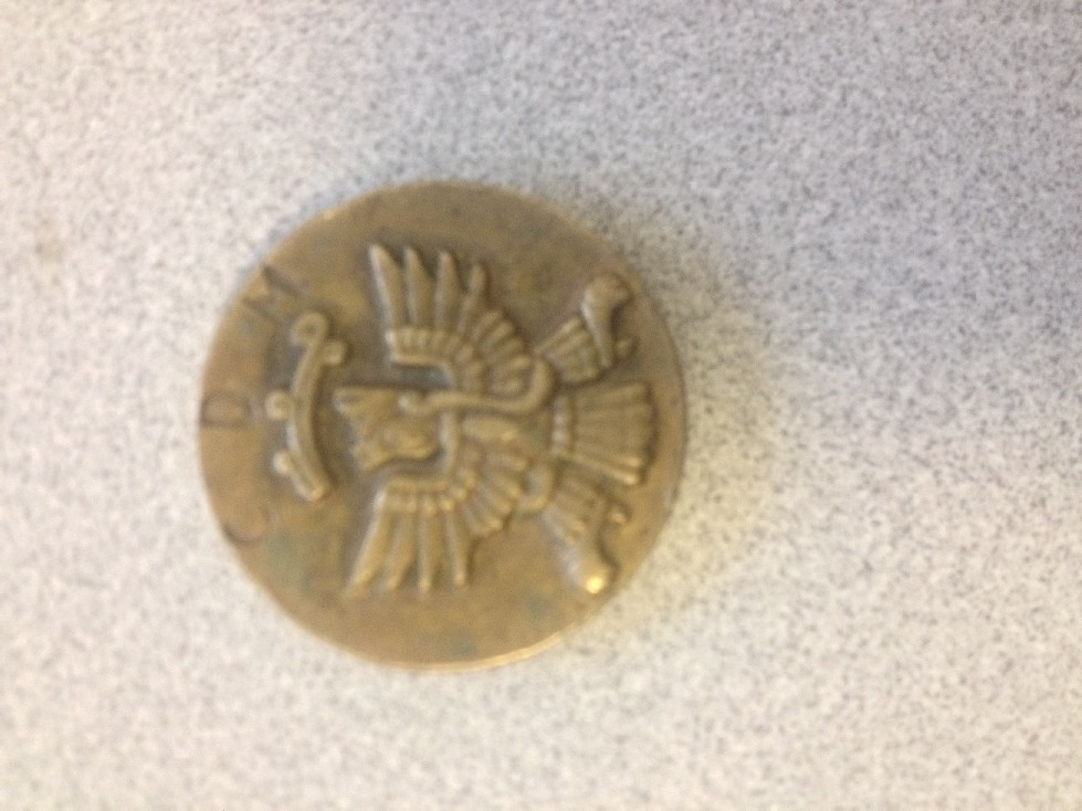 Photo 1 Pièce de monnaie non identifiée: ¿Alguien sabe si esto es una moneda o tiene información?