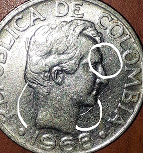 Photo 1 Pièce de monnaie non identifiée: moneda de 50 centavos de 1968 de colombia con error