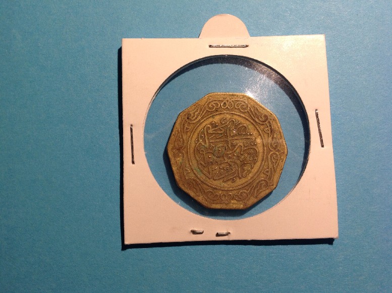 Photo 1 Pièce de monnaie non identifiée: Identificar moneda