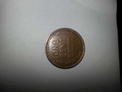 Photo 2 Pièce de monnaie non identifiée: el valor de esta moneda aunque no sea del 1944 pero es 1945
