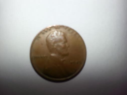 Photo 1 Pièce de monnaie non identifiée: el valor de esta moneda aunque no sea del 1944 pero es 1945