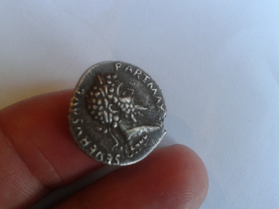 Photo 2 Pièce de monnaie non identifiée: moneda pequeñisima
