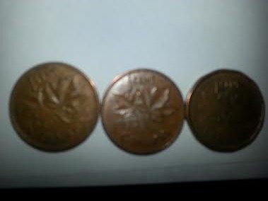 Photo 2 Pièce de monnaie non identifiée: saber si tiene algun costo