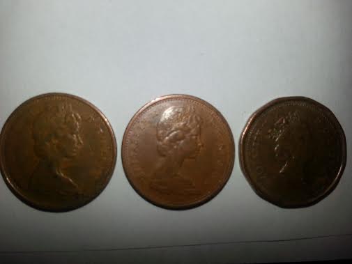 Photo 1 Pièce de monnaie non identifiée: saber si tiene algun costo