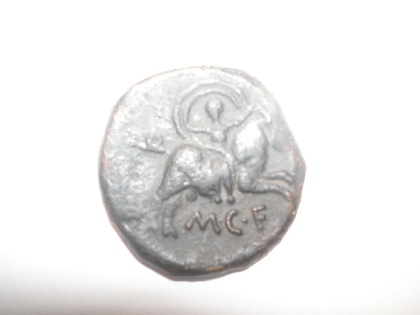 Photo 2 Pièce de monnaie non identifiée: Ayuda con esta moneda por favor.