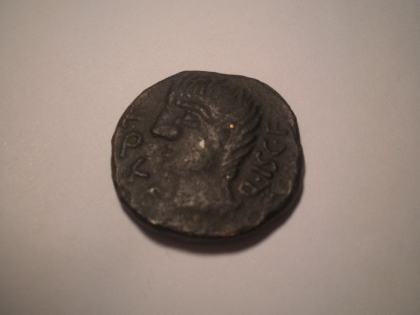 Photo 1 Pièce de monnaie non identifiée: Ayuda con esta moneda por favor.