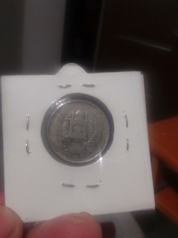 Photo 2 Pièce de monnaie non identifiée: moneda 