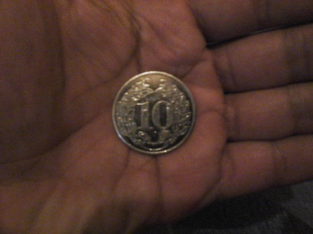 Photo 2 Pièce de monnaie non identifiée: Moneda sin identificar