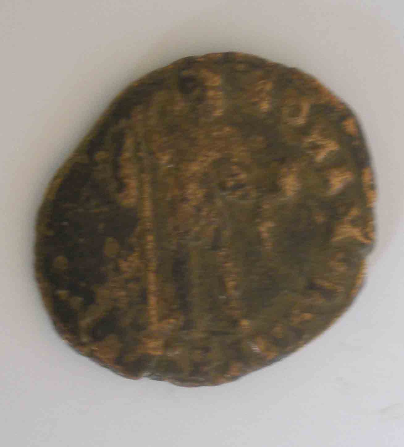 Photo 2 Pièce de monnaie non identifiée: 4