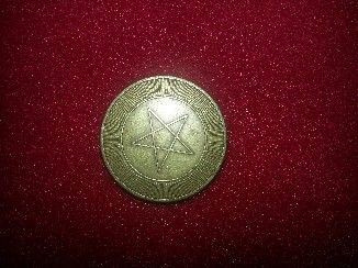 Photo 2 Pièce de monnaie non identifiée: Estrella