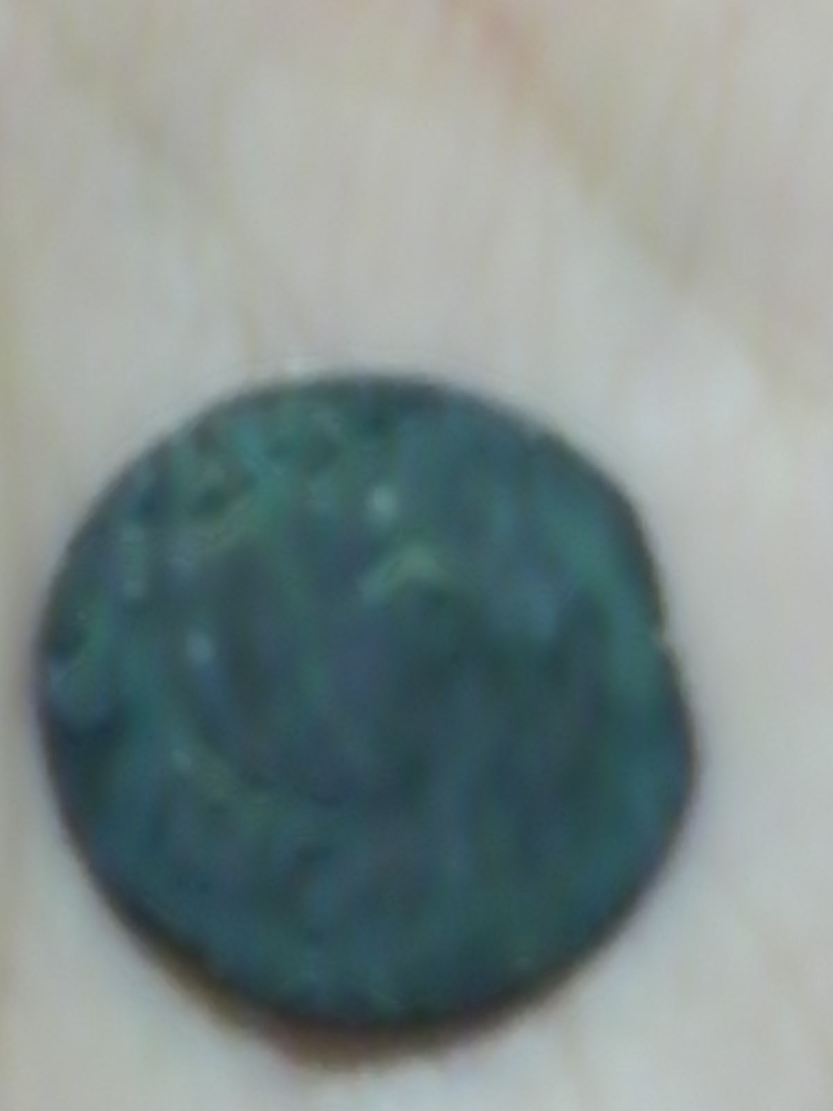 Photo 1 Pièce de monnaie non identifiée: Moneda encontrada.
