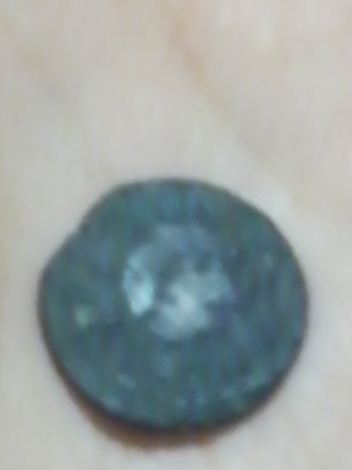 Photo 2 Pièce de monnaie non identifiée: Moneda encontrada.