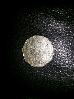 Photo 2 Pièce de monnaie non identifiée: moneda 