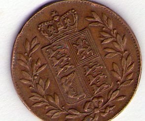 Photo 2 Pièce de monnaie non identifiée: es una moneda?