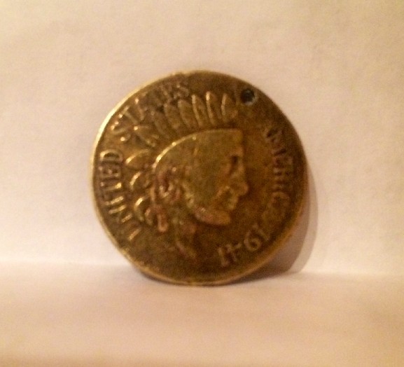 Photo 1 Pièce de monnaie non identifiée: Moneda de 5 dólares de los Estados Unidos de América con un indio invertido