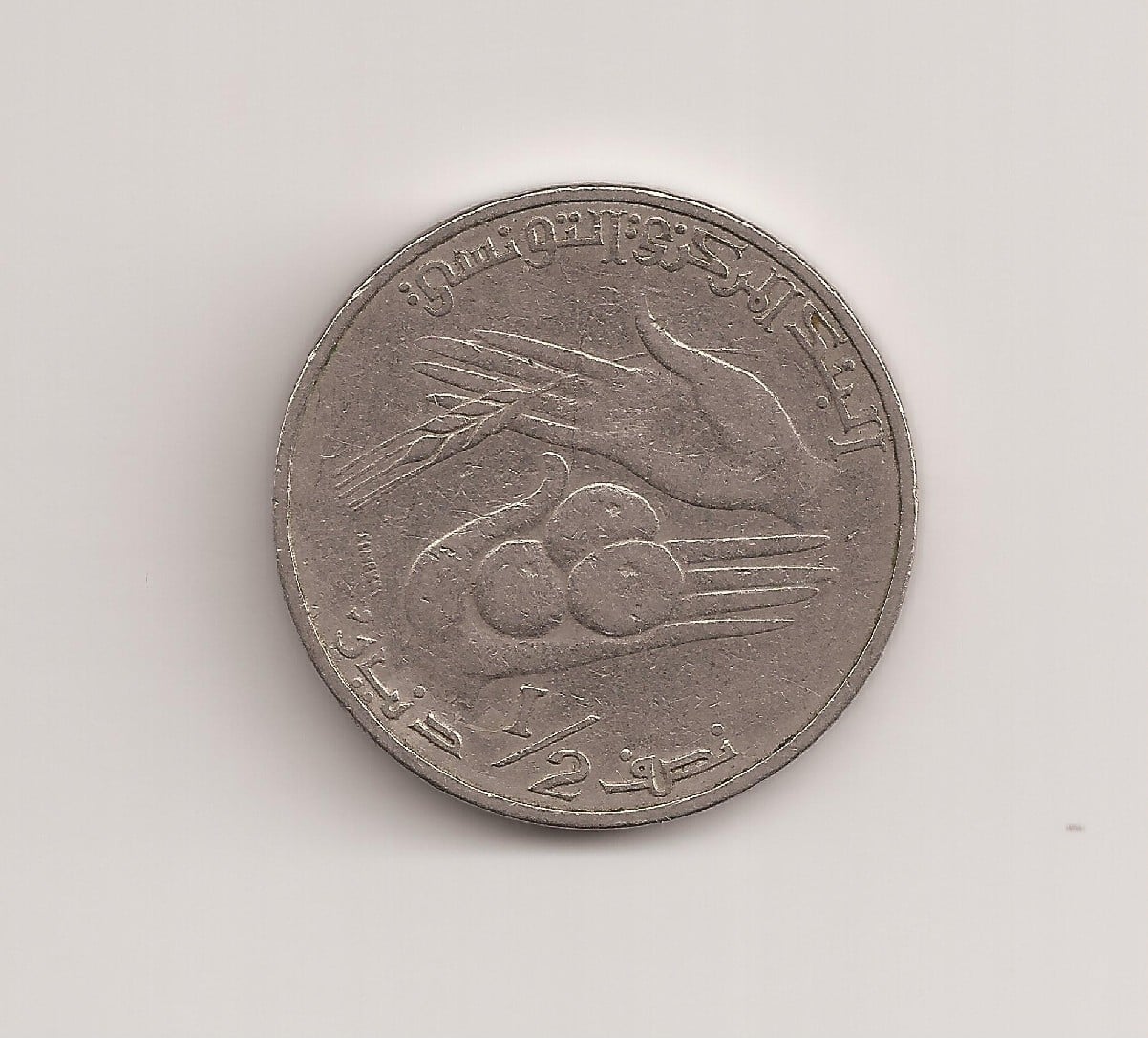 Photo 2 Pièce de monnaie non identifiée: ¿País?