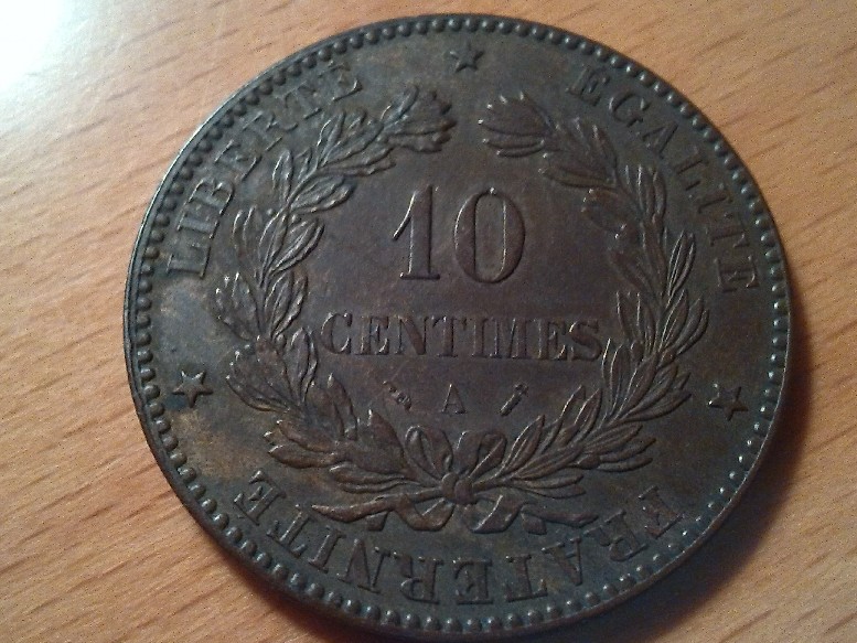 Photo 2 Pièce de monnaie non identifiée: hola gracias lo primero ,podrias decirme el valor de esta moneda esta sin circular gracias 