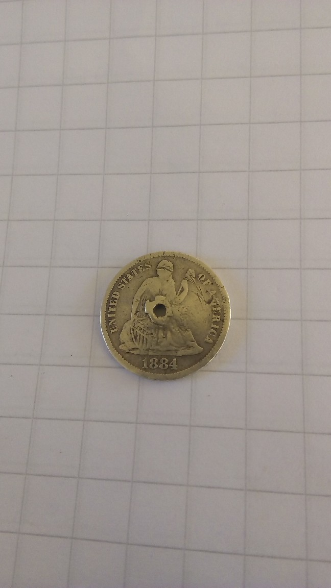 Photo 1 Pièce de monnaie non identifiée: Moneda americana