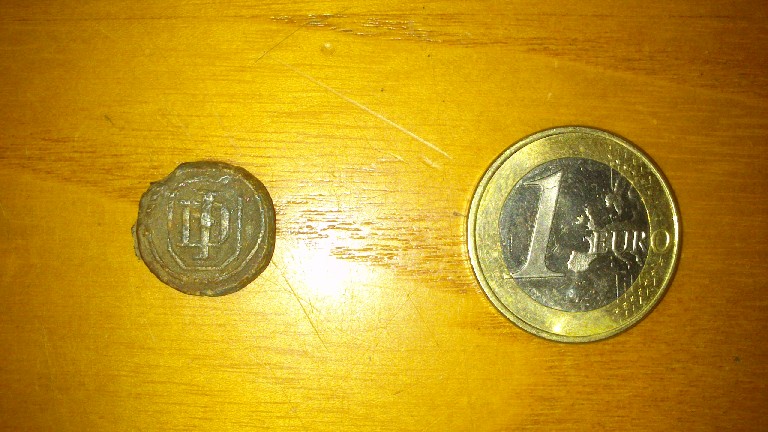 Photo 2 Pièce de monnaie non identifiée: Alguien sabe si esto es una moneda?