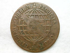 Photo 1 Pièce de monnaie non identifiée: Moneda de XX Reis de Brasil año 1799, RESELLADA.-