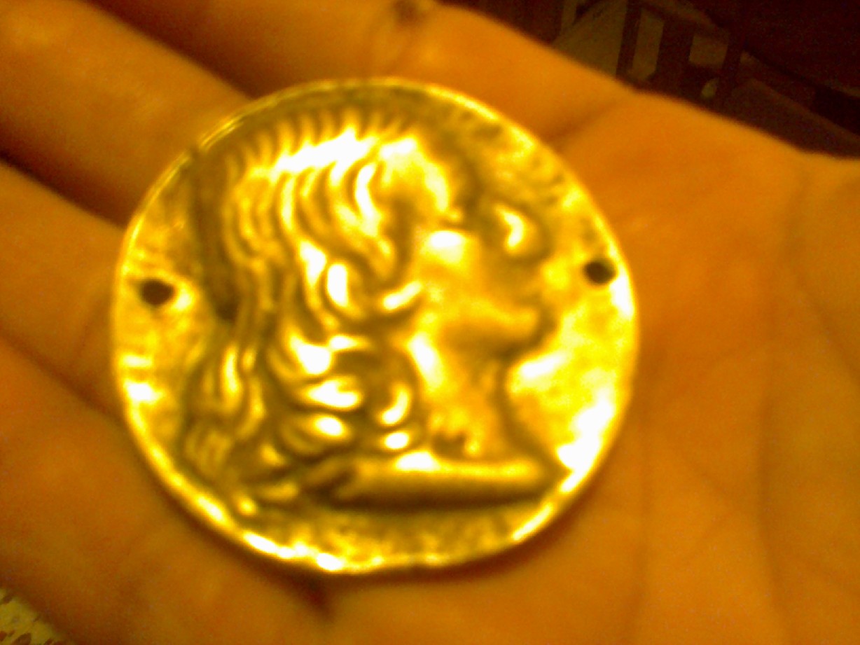 Photo 1 Pièce de monnaie non identifiée: necesito saber si es una moneda, de donde es y que epoca?