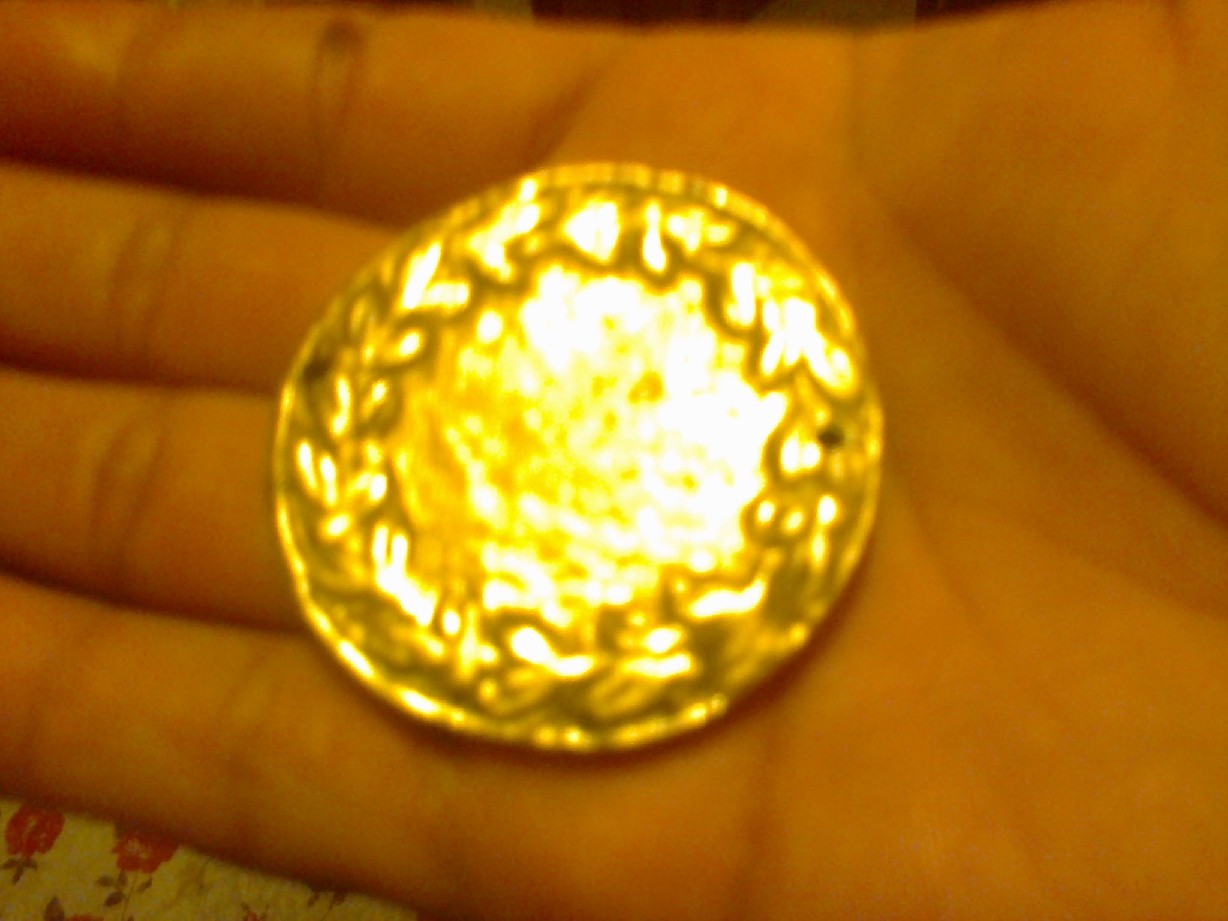 Photo 2 Pièce de monnaie non identifiée: necesito saber si es una moneda, de donde es y que epoca?