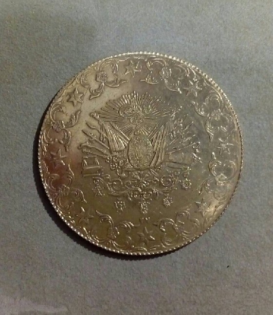 Photo 1 Pièce de monnaie non identifiée: Quien me puede ayudar de donde es esta moneda