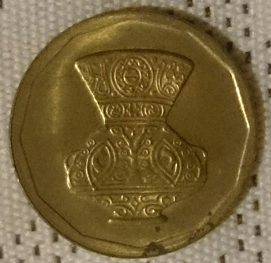 Photo 1 Pièce de monnaie non identifiée: Moneda dorada